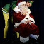 buddy hugs santa from elf jr at greasepaint youth theatre in scottsdale
